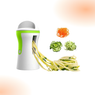 Vegetable spiralizer with sliced vegetables on a gradient background